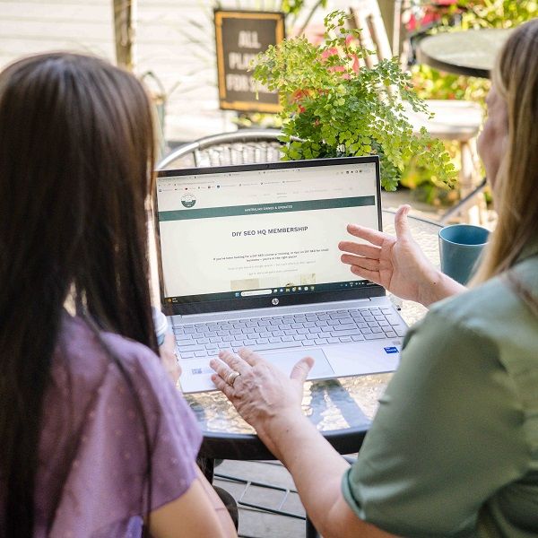 two business women in front of laptop looking at our online DIY SEO training
