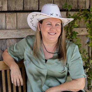 Janet Camilleri is an SEO Specialist known for white hat SEO - so she is wearing a white cowboy hat!