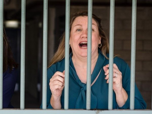 woman behind bars to depict a Google penalty just one of the SEO horror stories